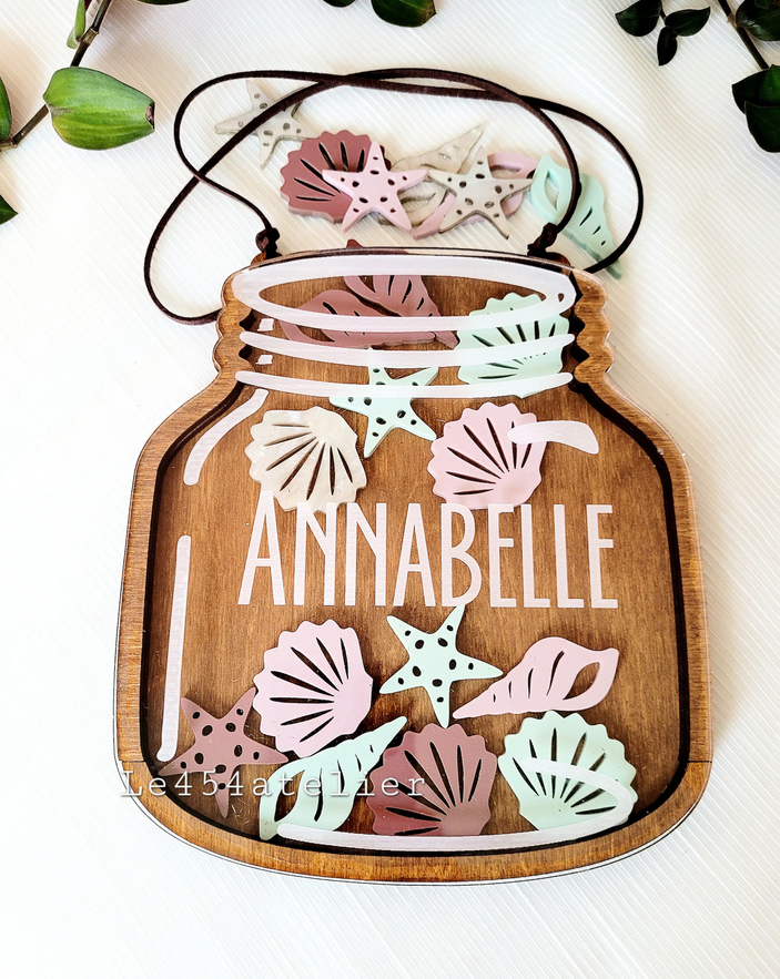 Wood and plexiglas reward jar with pink and mint seashell acrylic tokens